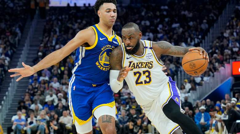 LeBron James drives past Trayce Jackson-Davis